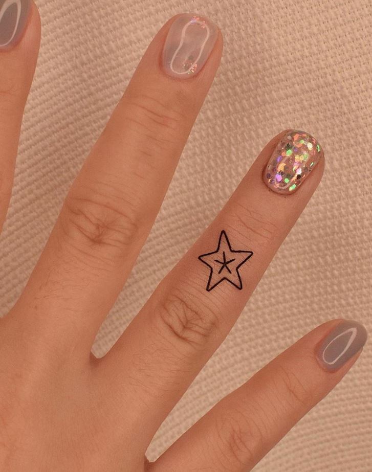 Tiny Star Tattoo
