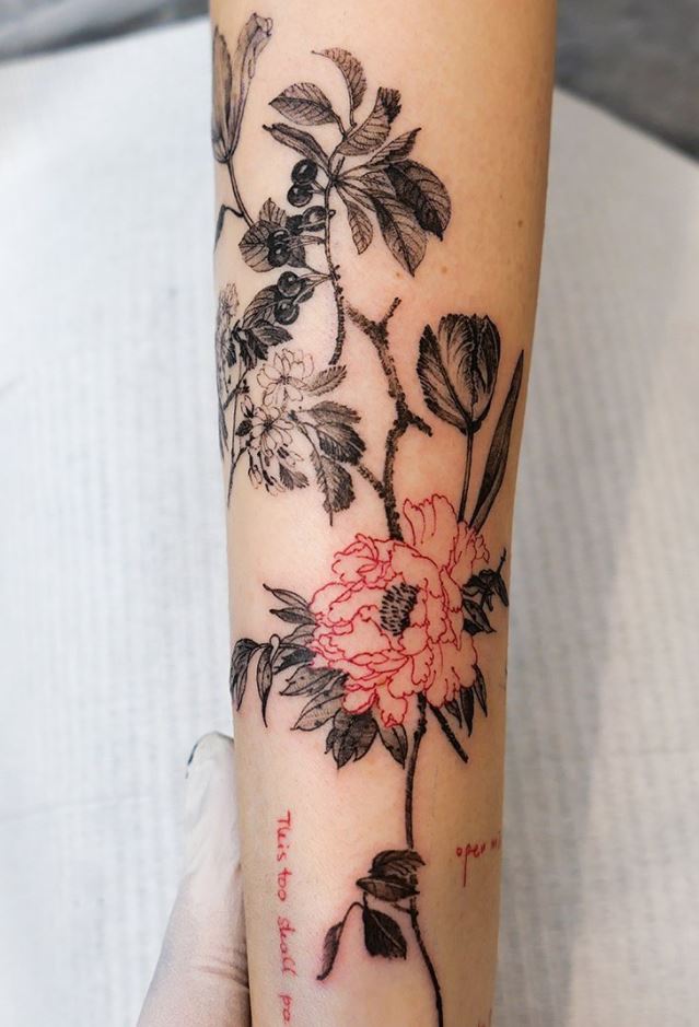 Remarkable Flowers Tattoo