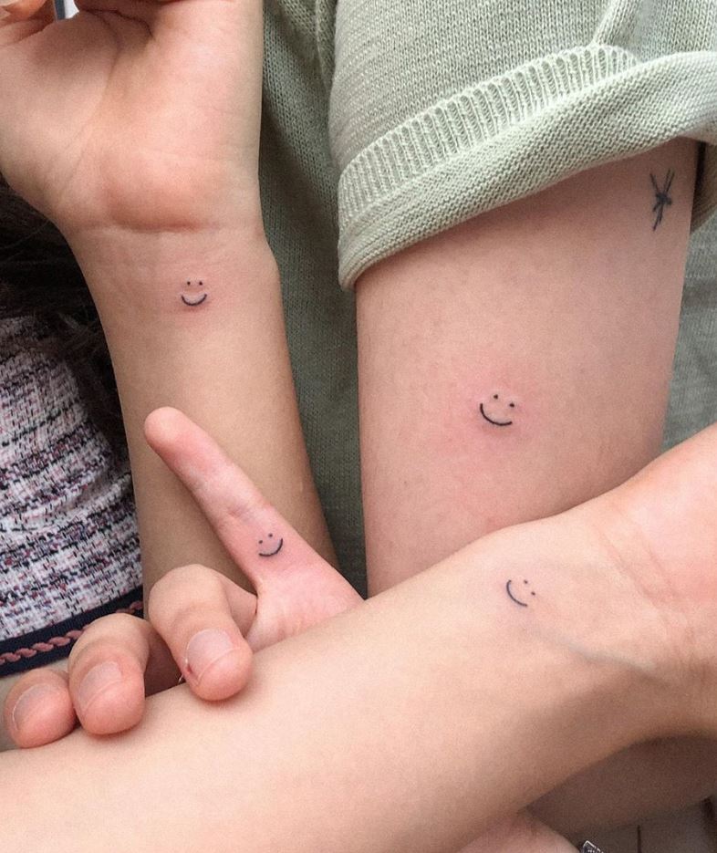 Matching Smiley Tattoos